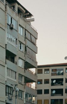 Contemporary apartment buildings with balconies in a residential area.