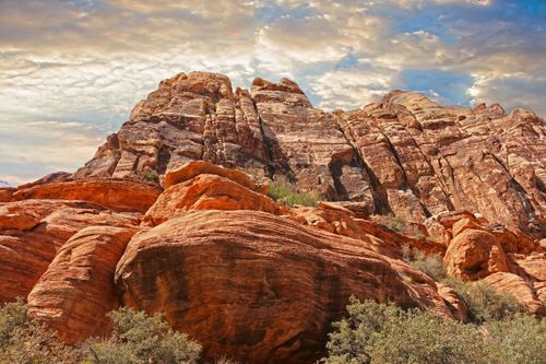 Free Capture of Red Rock Canyon's stunning geological formations during a serene sunset. Stock Photo