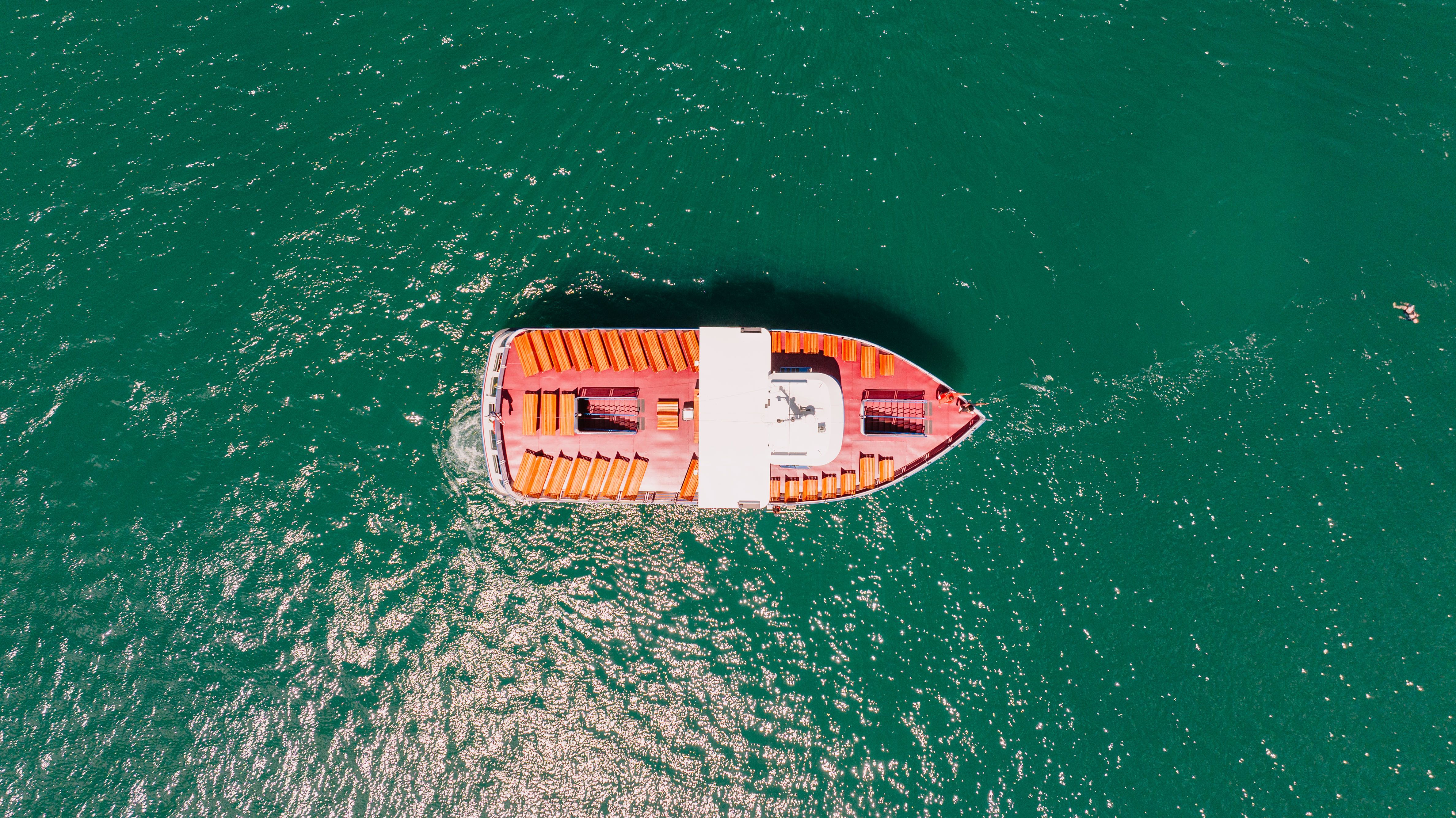 An aerial view of a boat in the ocean · Free Stock Photo