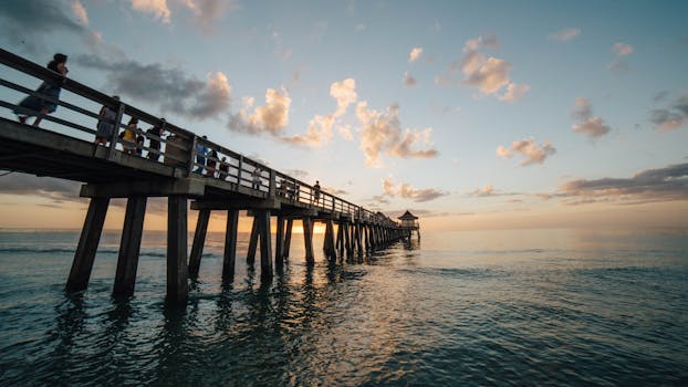 Pier on Sea Against Cloudy Sky