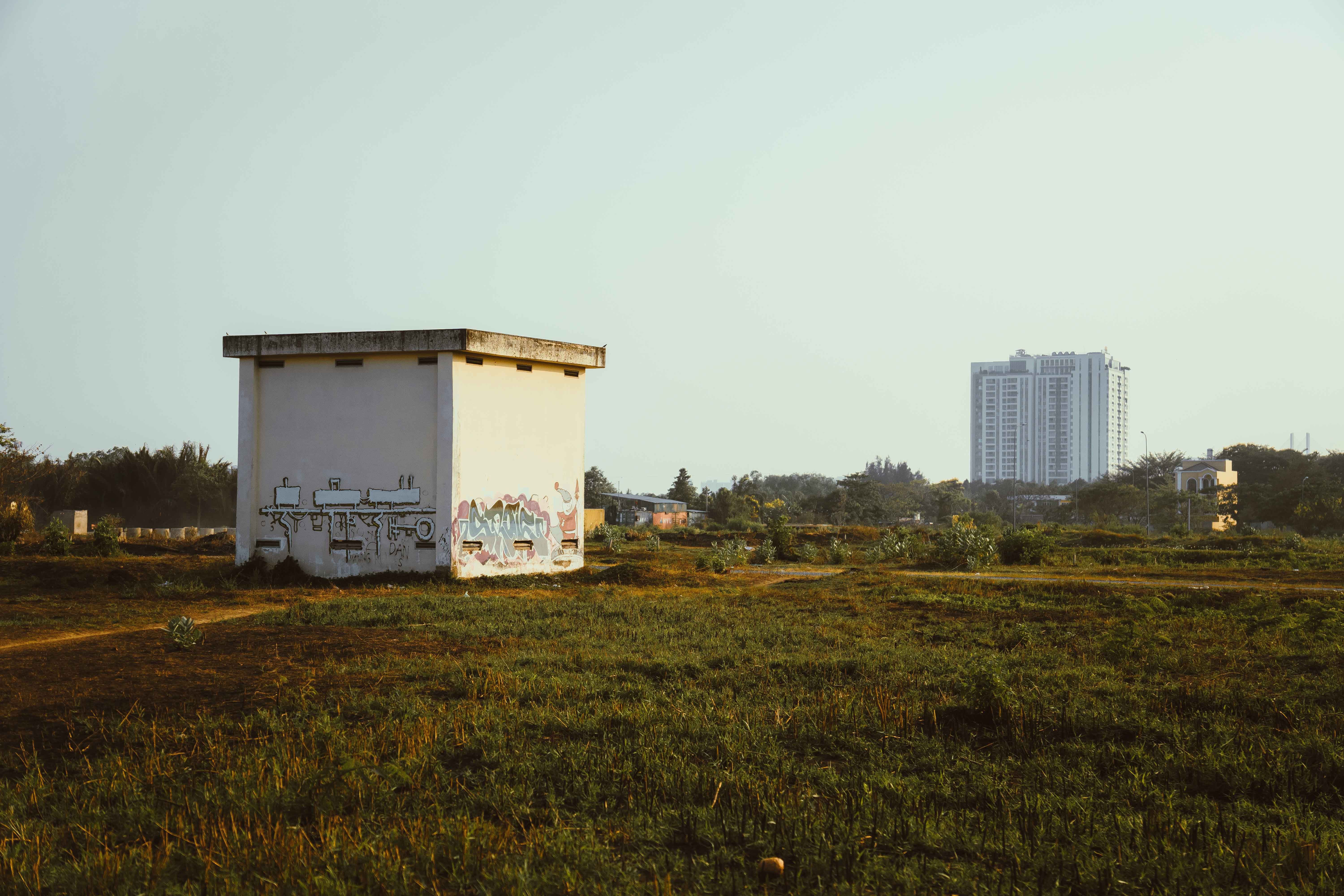 Hotel generator housing and water storage tanks behind a Nairobi property