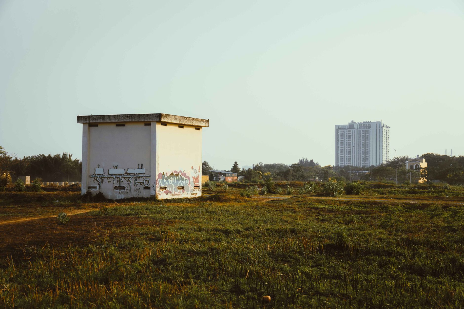 Hotel generator housing and water storage tanks behind a Nairobi property