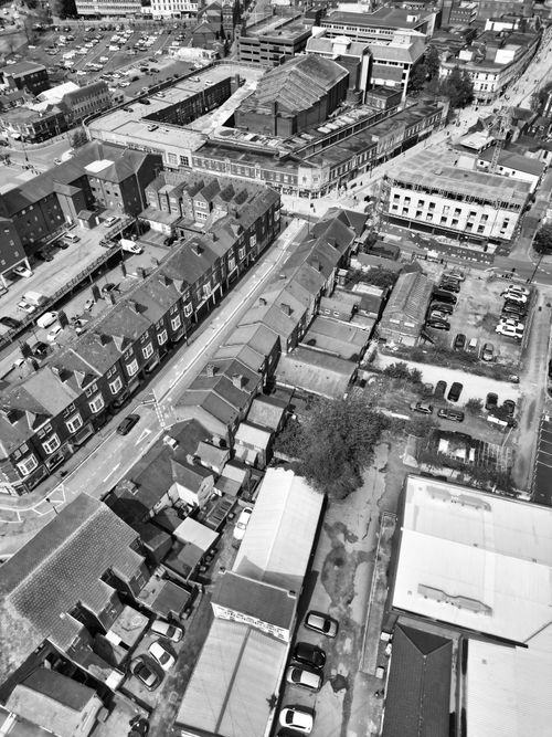 Free Black and white aerial shot of West Midlands showcasing urban buildings and streets. Stock Photo