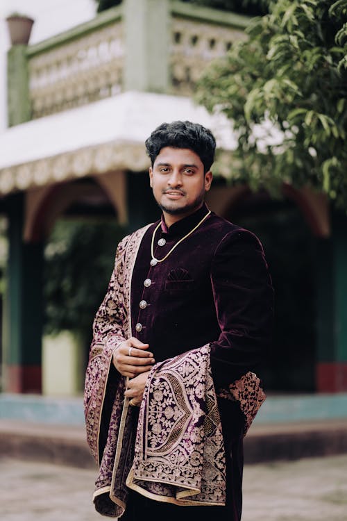 Photo of a Groom Wearing a Traditional Sherwani
