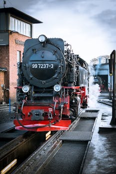 Steam locomotive 99 7237-3 at Wernigerode Railway Station, exuding vintage charm.