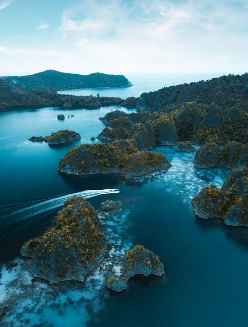 Free Aerial Photo of Islands on Sea Stock Photo