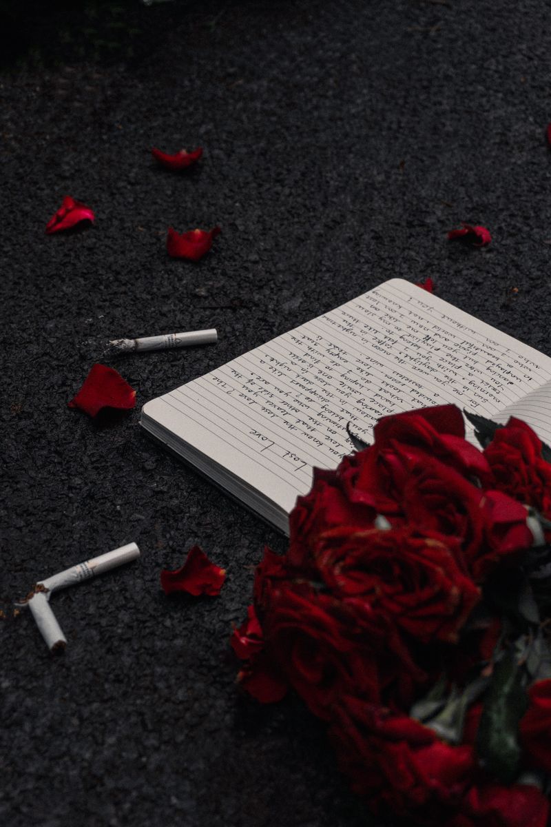 Red Roses and Notebook · Free Stock Photo