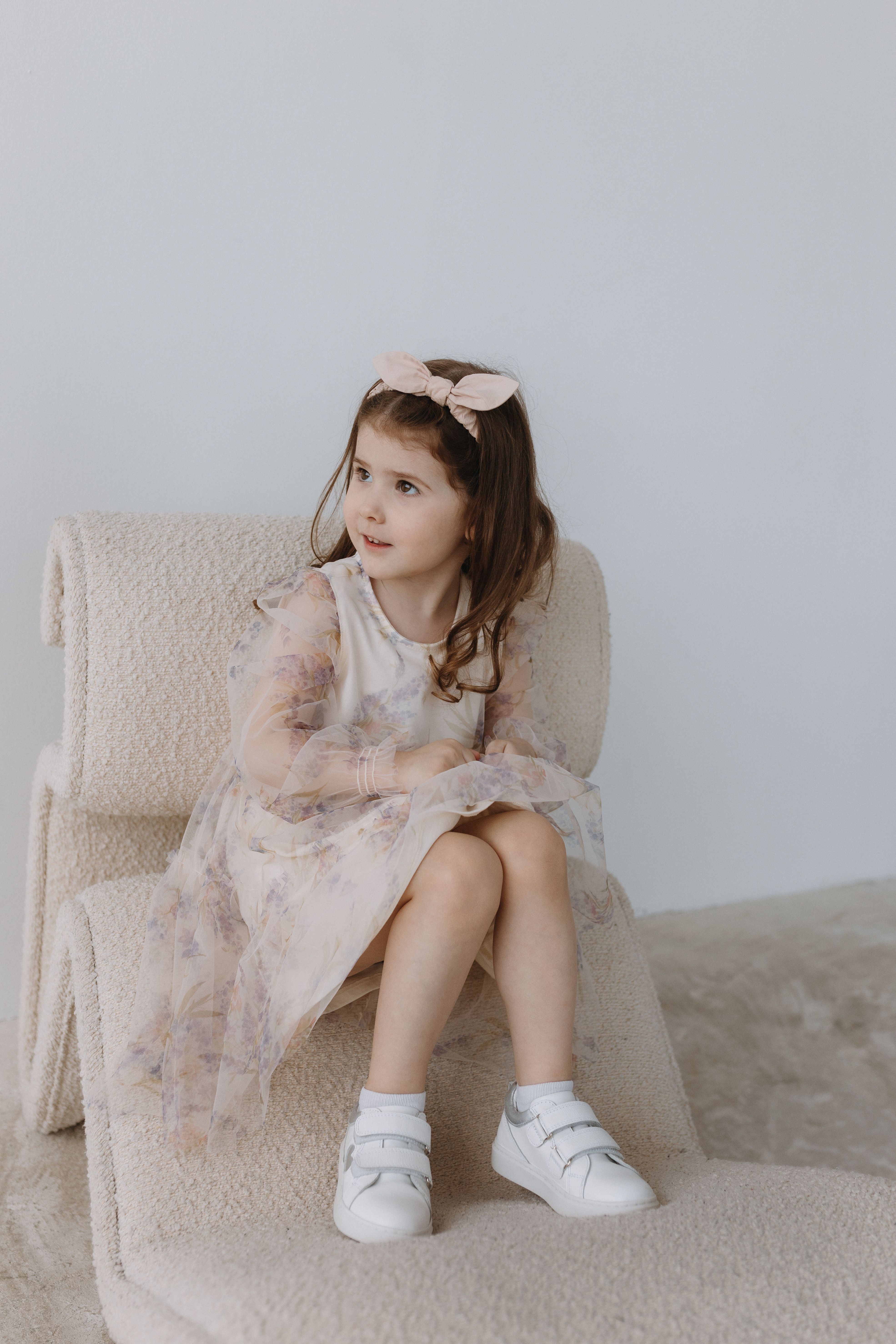 Studio Shot of a Little Girl Wearing an Elegant Dress · Free Stock Photo
