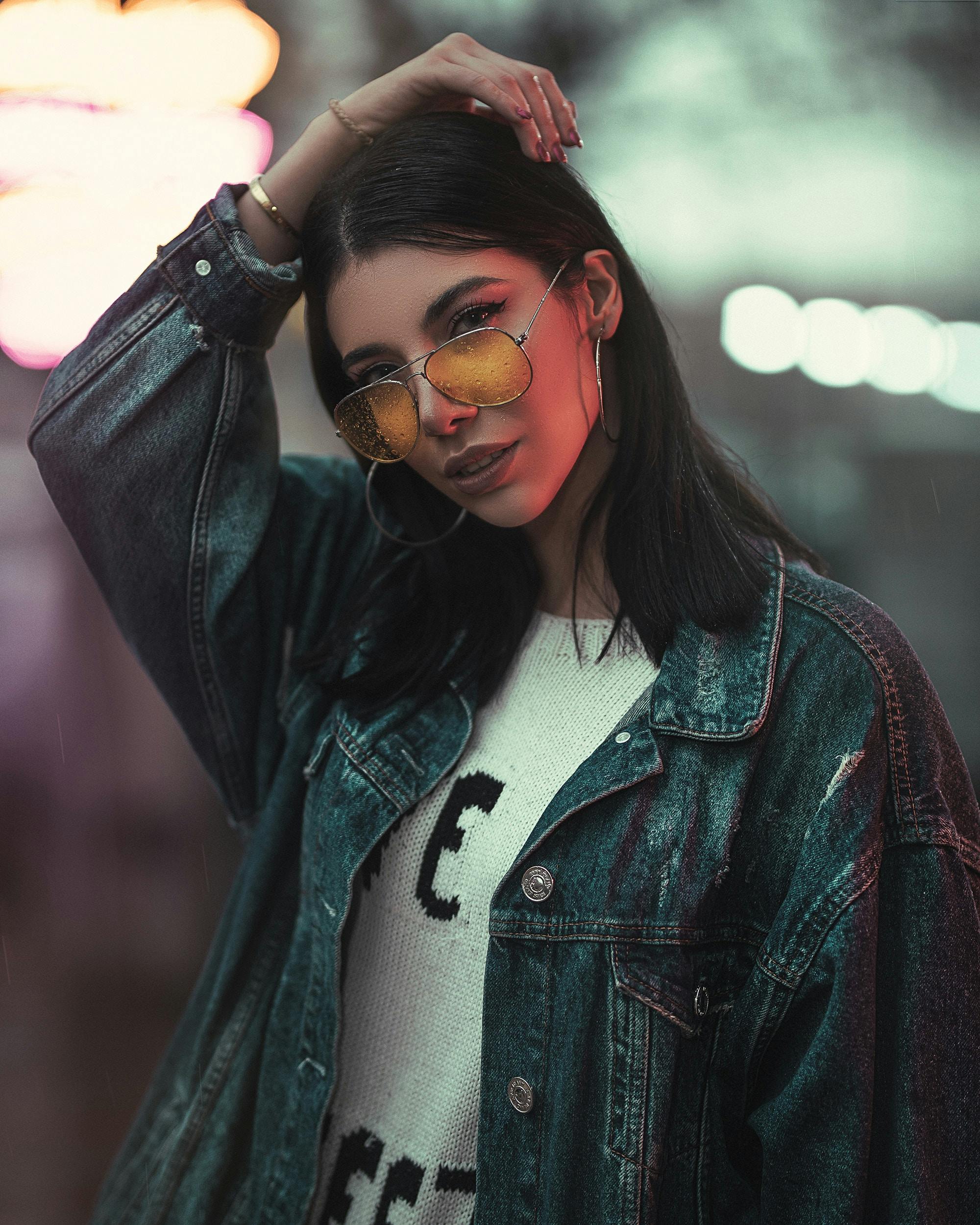 photo of woman in denim jacket