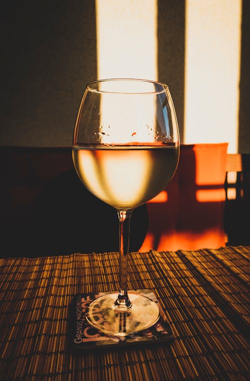 Free Photo of Glass of White Wine on Table Stock Photo