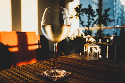 Photo of Glass of Wine on the Table