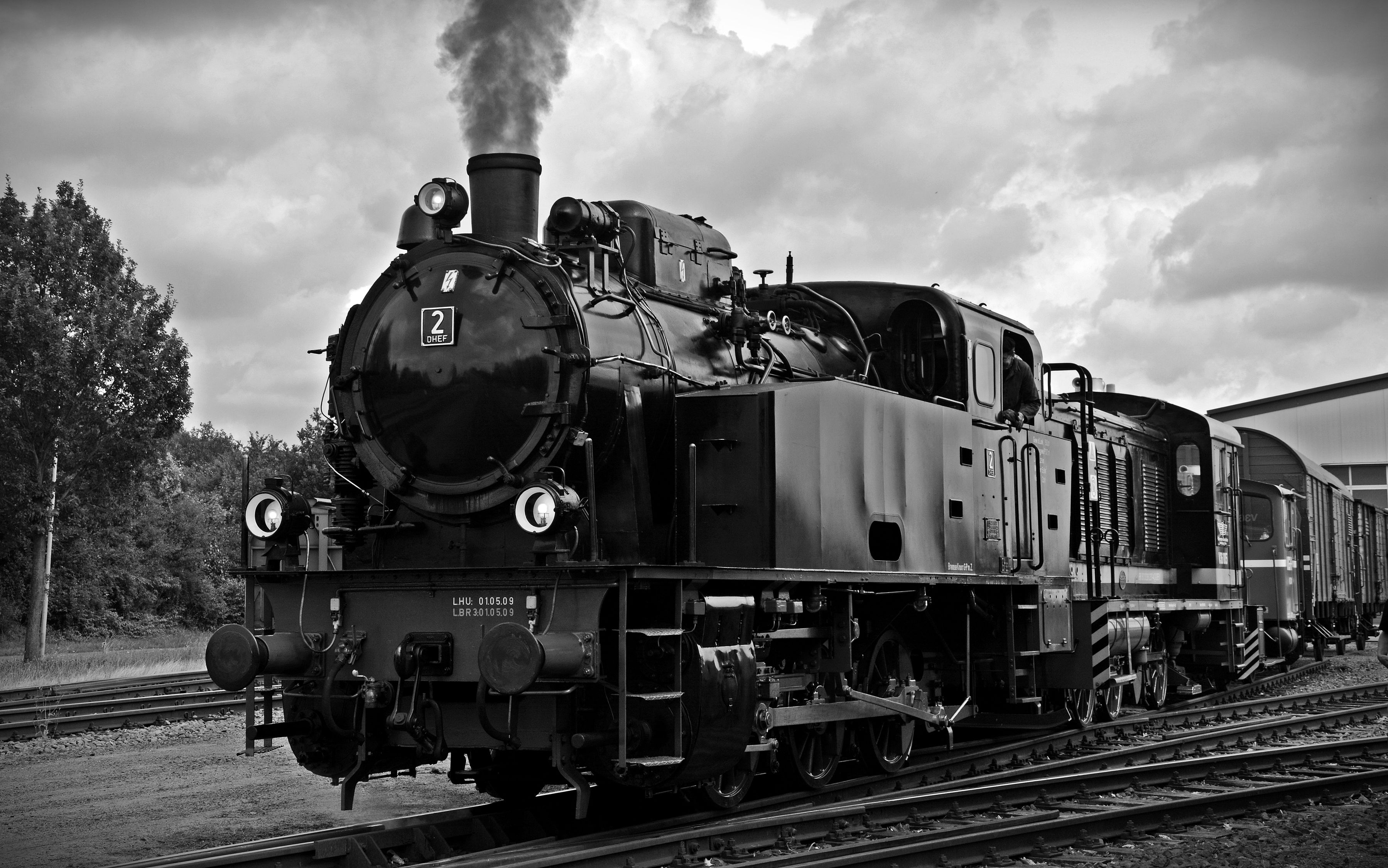 Train on Railroad Tracks Against Sky · Free Stock Photo