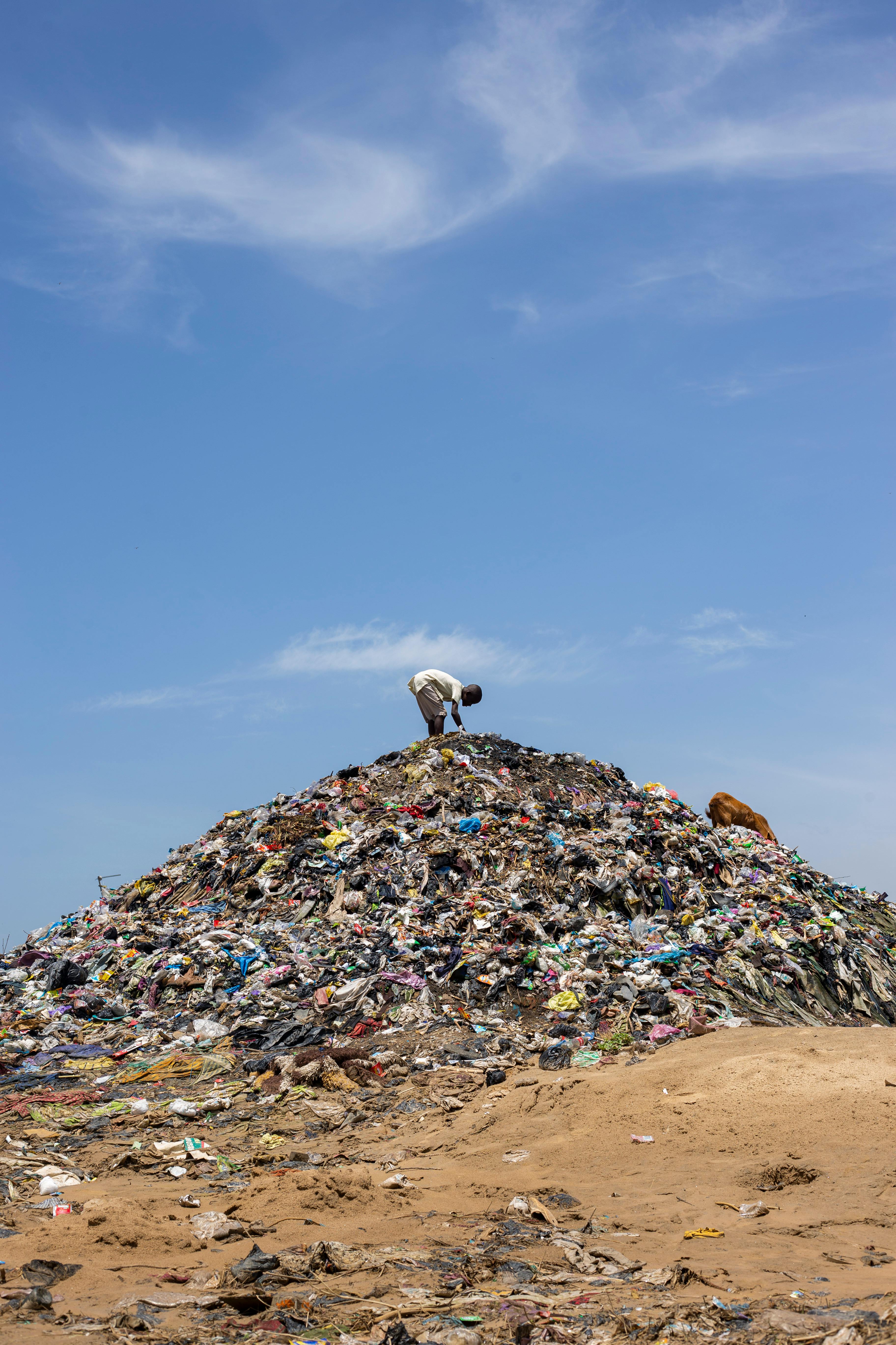 man working at garbage dump