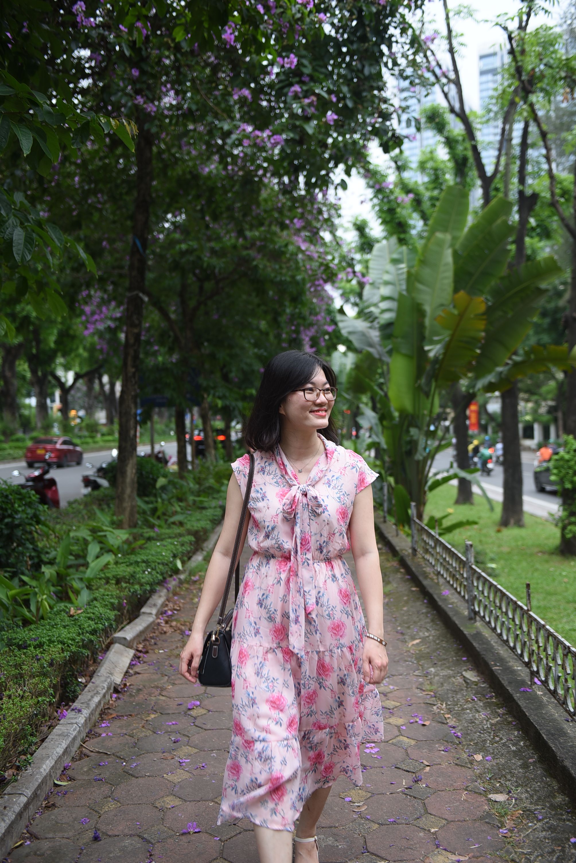Smiling Woman in Pink Dress Walking Down the Sidewalk · Free Stock Photo