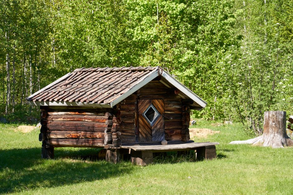 Rustic wooden hytte cabin nestled in a Norwegian national park