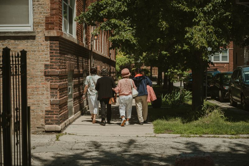 Tree-lined residential sidewalk in a Chicago neighborhood