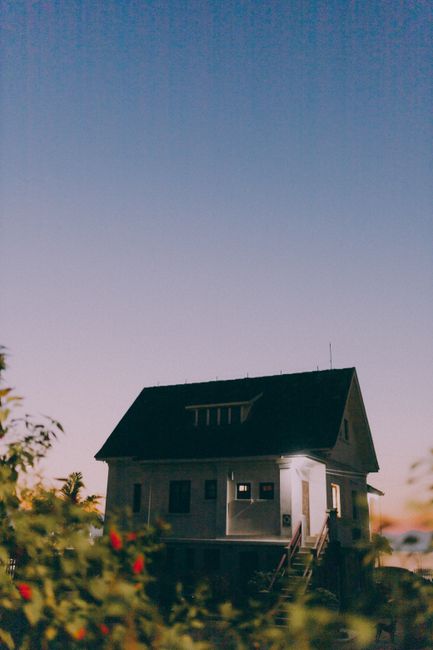 Charming rural house under a twilight sky, perfect for serene living and countryside vibes.