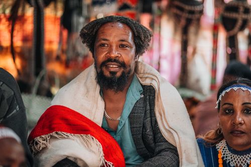 Free A smiling African man in traditional clothing, embodying cultural heritage and joy. Stock Photo