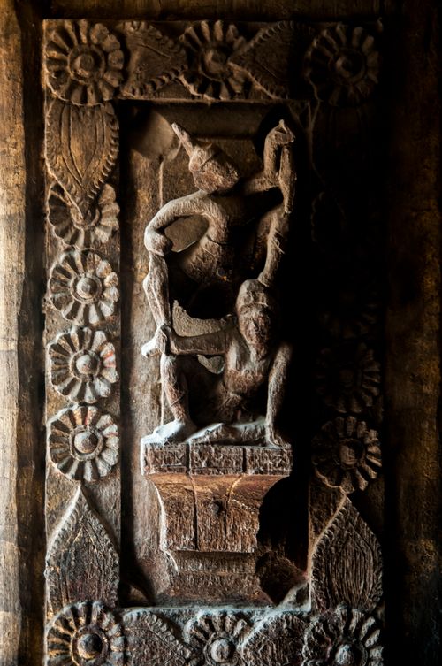 Free A detailed wall sculpture at Sandamuni Pagoda, Mandalay, capturing exquisite craftsmanship. Stock Photo