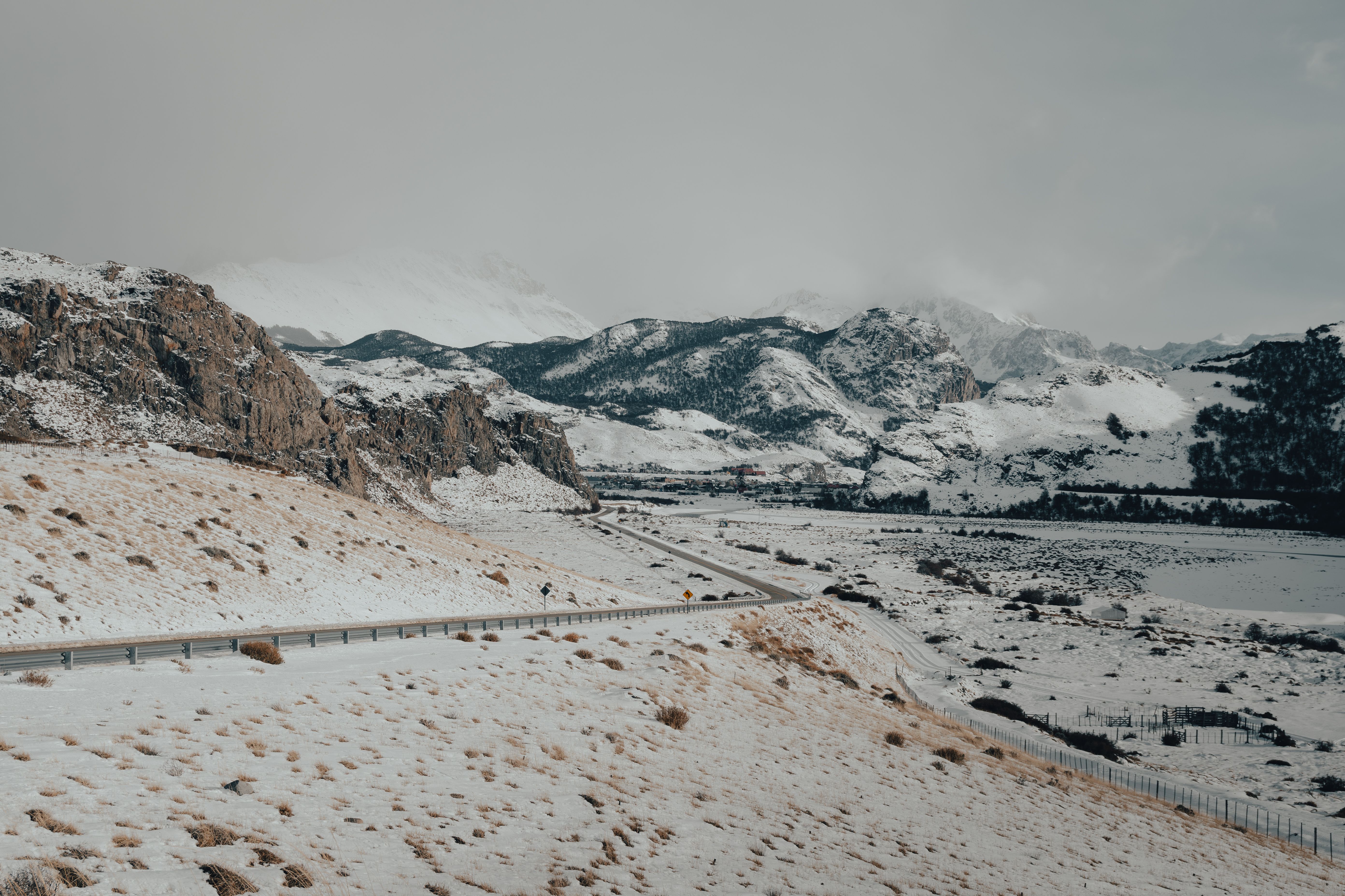 Mountain highway and border crossing path at dawn