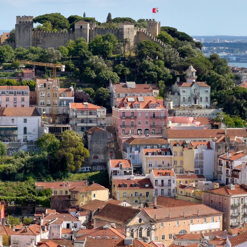 Hillside city rooftops at midday — Bento Justin on Pexels
