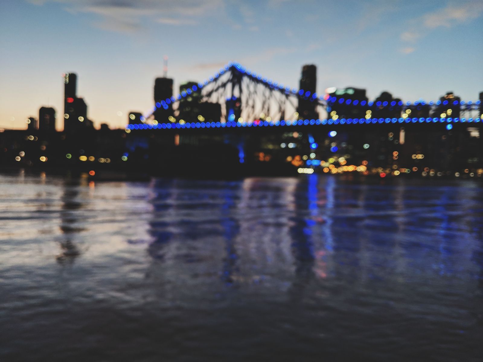 Story Bridge lit up at night over the Brisbane River