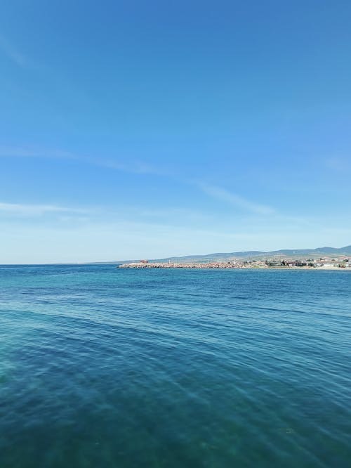 Foto profissional grátis de água, ao ar livre, areia