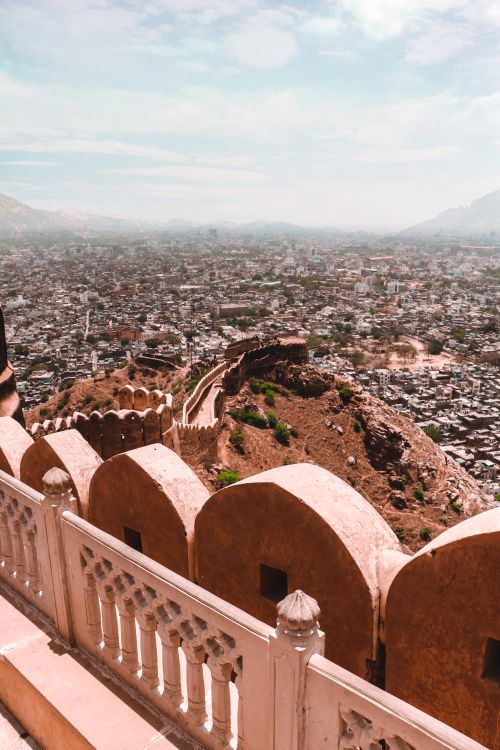 Free Scenic aerial view of Jaipur city with historic Nahargarh Fort walls in Rajasthan, India. Stock Photo