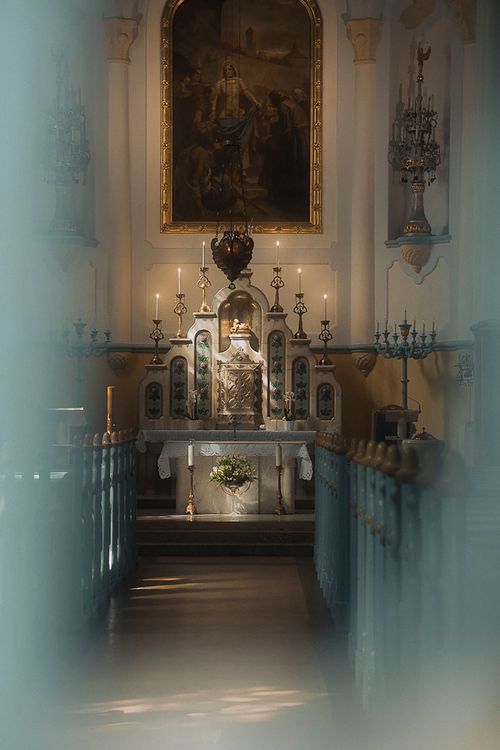Free Beautifully lit altar in a historic Bratislava church interior, showcasing ornate details and religious ambiance. Stock Photo