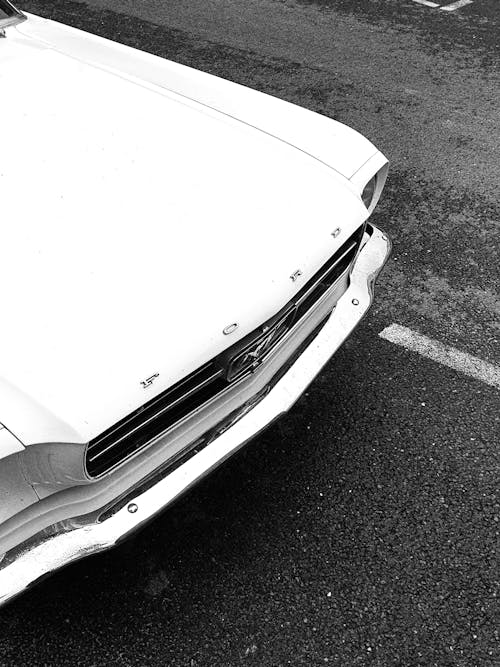 White Ford Mustang Coupe on Road