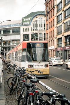 Tram on Tracks in City by Shima Nia