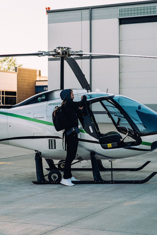 Free Person Standing Beside Helicopter Stock Photo