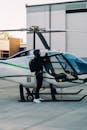 Person Standing Beside Helicopter
