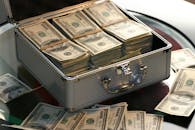 Hard Cash on a Briefcase