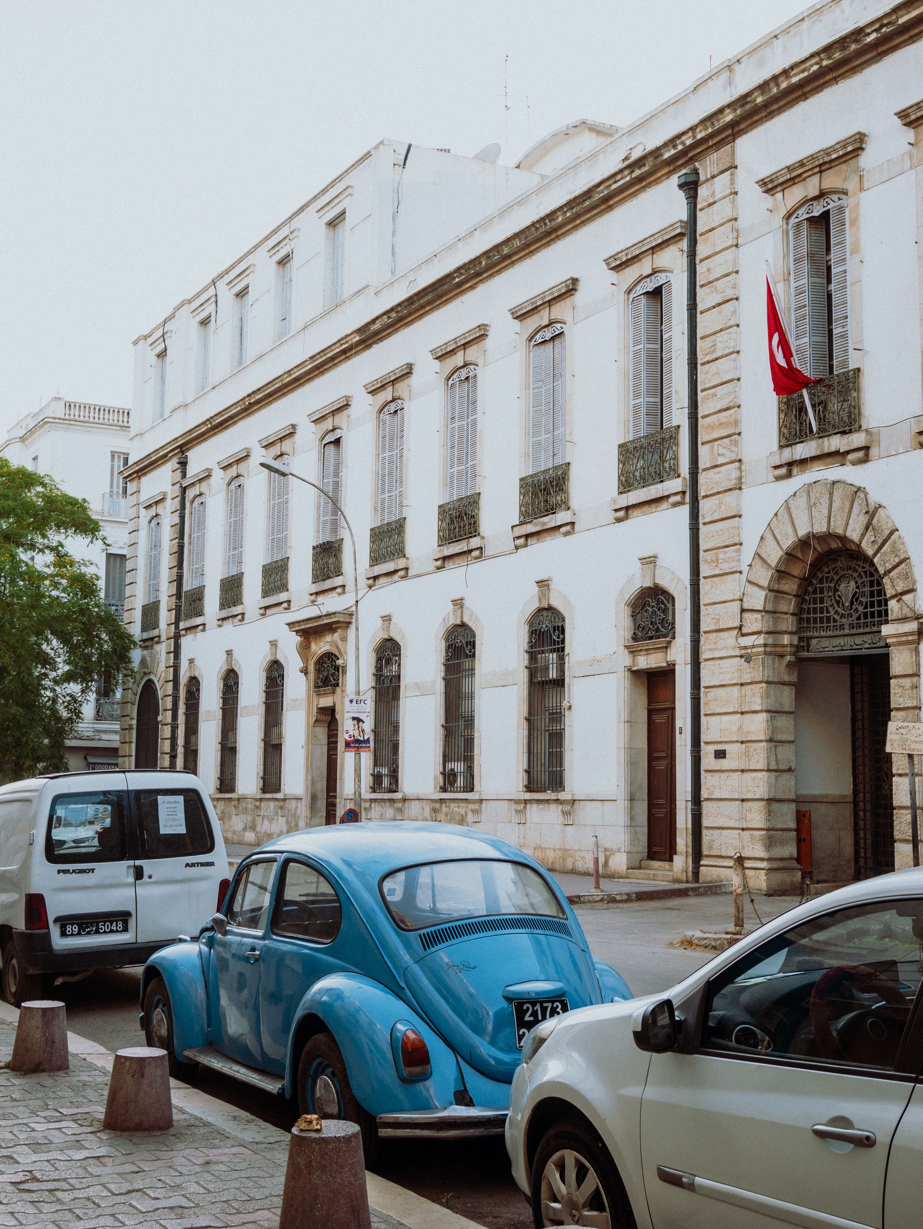 View of Cars Parked on the Side of a Street in a City · Free Stock Photo