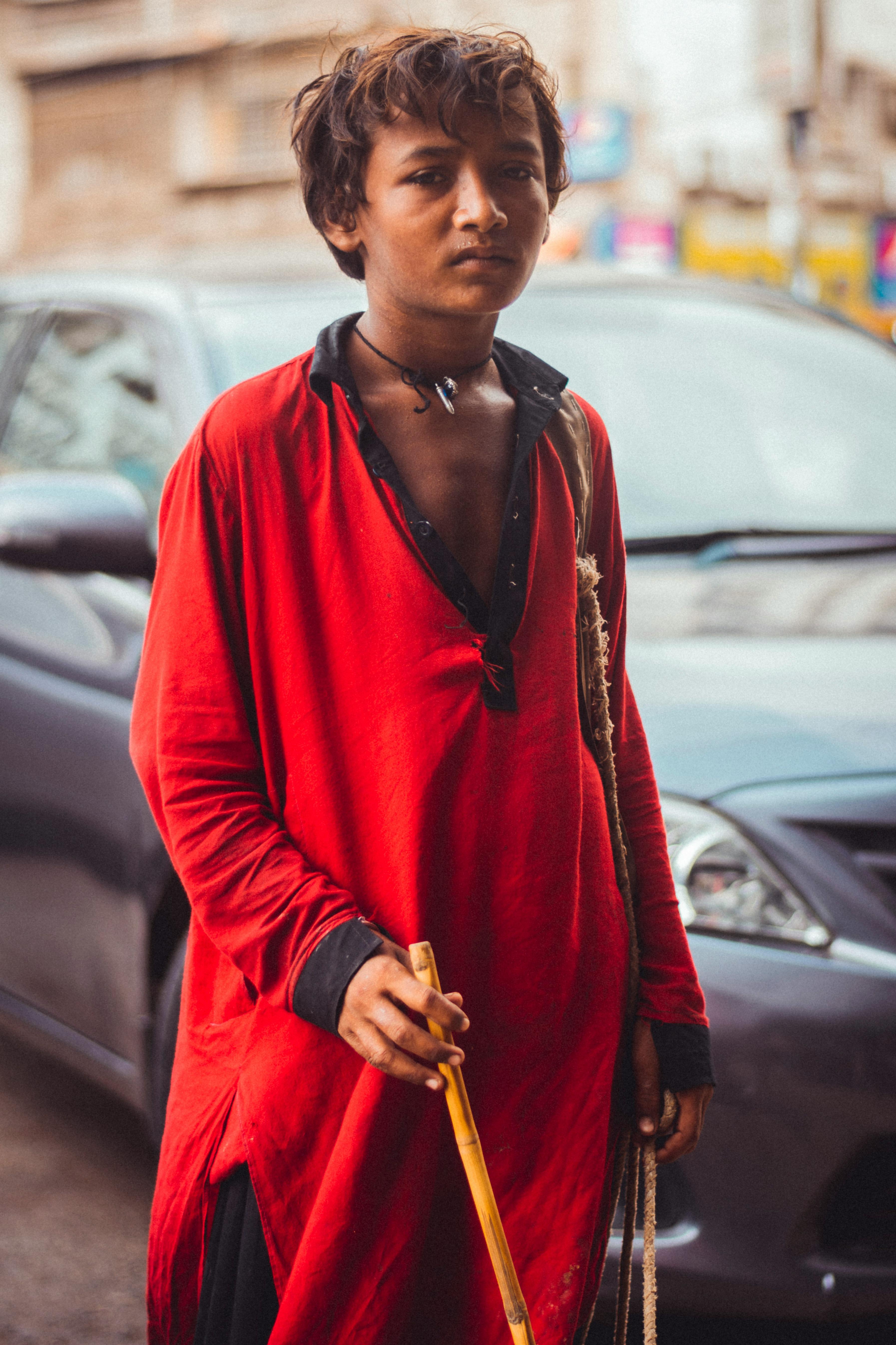 boy in a red long sleeve top