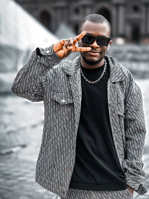 Foto profissional grátis de afro-americano, airpods, dinâmico