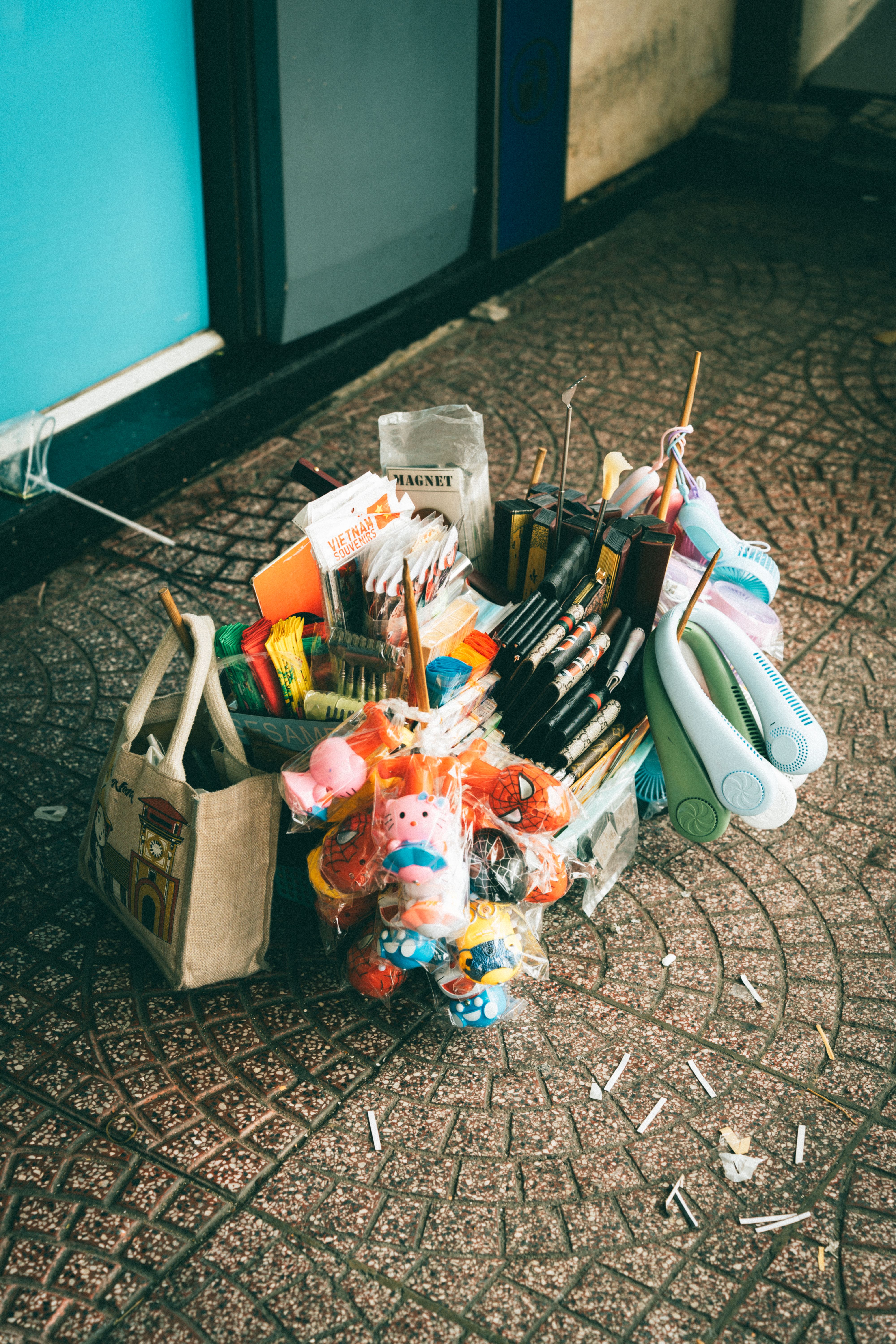 A Variety of Items for Sale Standing on the Pavement · Free Stock Photo