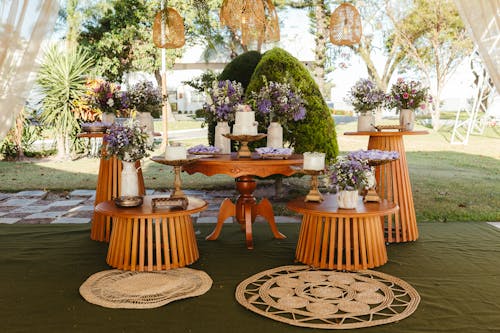 A table with a table cloth and flowers on it