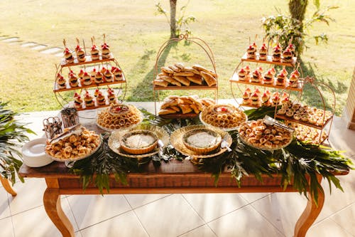 A table with a variety of desserts and cakes