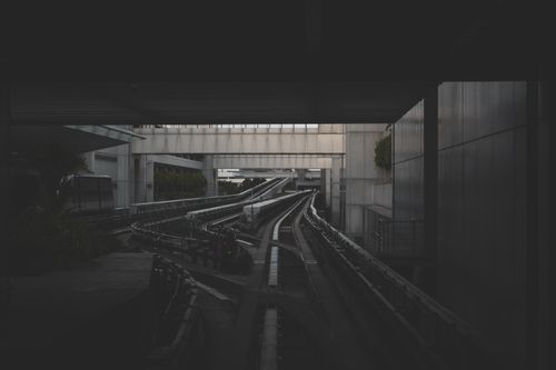 Free View of a modern urban transit system in Singapore with intricate tracks and architecture. Stock Photo