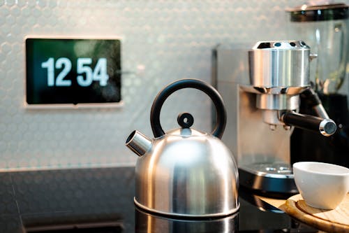 Home kitchen interior kettle on shrub plate