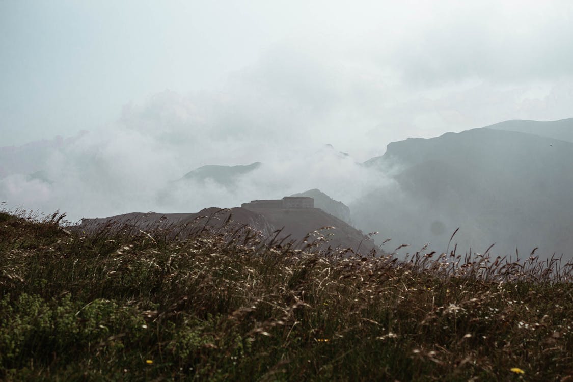 Free Photo of Mountains Covered With Fog Stock Photo