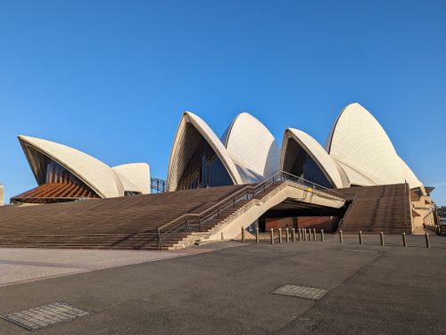 Free Stunning view of the Sydney Opera House under clear skies showcasing its unique design. Stock Photo