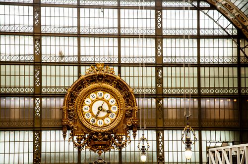 Free Elegant gilded clock in Musée d'Orsay, Paris, showcasing classic architecture. Stock Photo