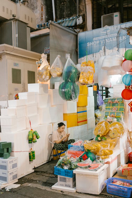 A street vendor selling fruit and vegetables in hong kong