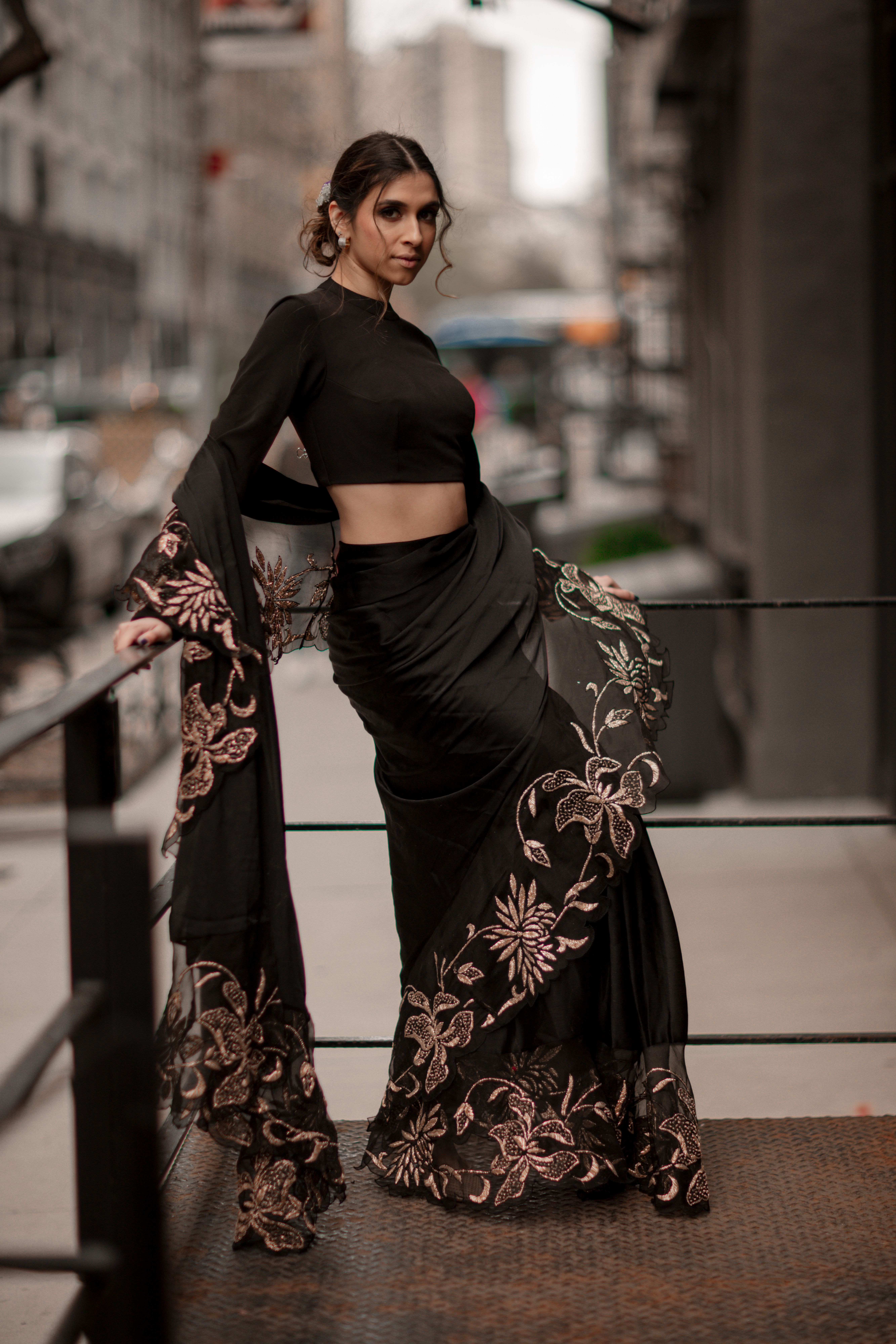 Woman in Elegant Dress with Scarf Standing on Balcony · Free Stock Photo