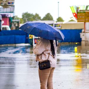 Umbrella in the rain, photo by Ahnaf Piash on Pexels