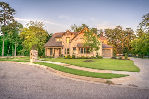 Brown Brick House Beside Trees