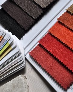 Close-up of fabric swatches and color palette, ideal for interior design and textile projects.